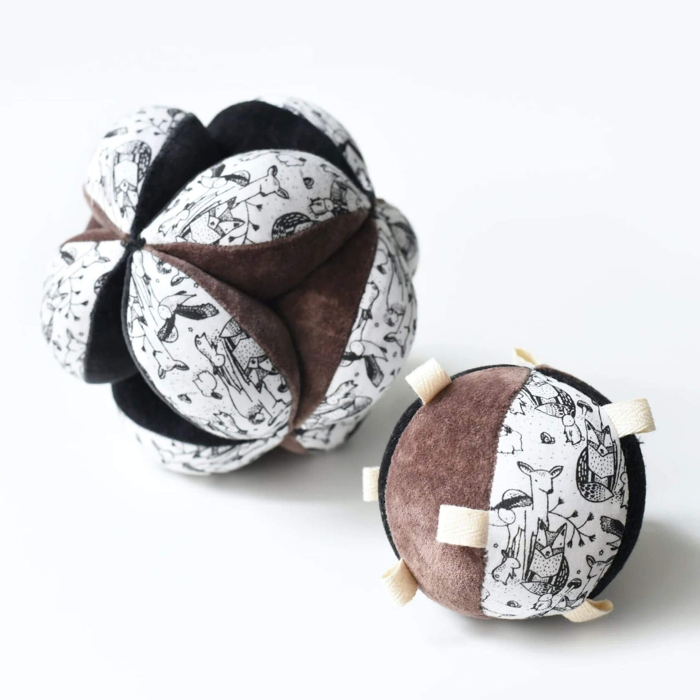 Organic Montessori Taggy Ball with Rattle - Woodland