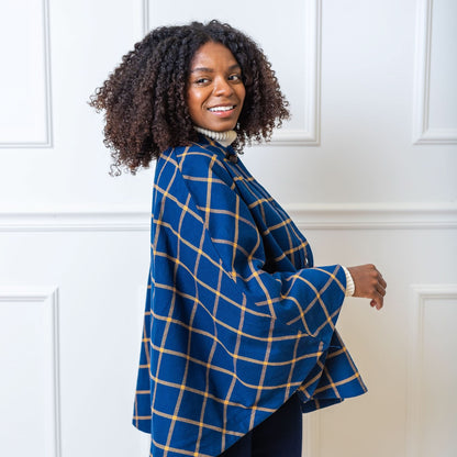 Women's Woven Cape with Button Front