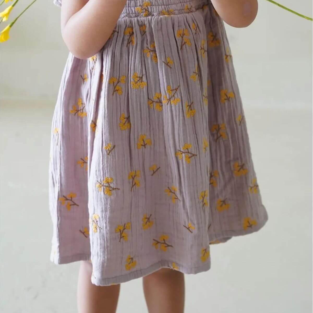 Haven Toddler Organic Floral Dress - Lavender skirt detail close up on model